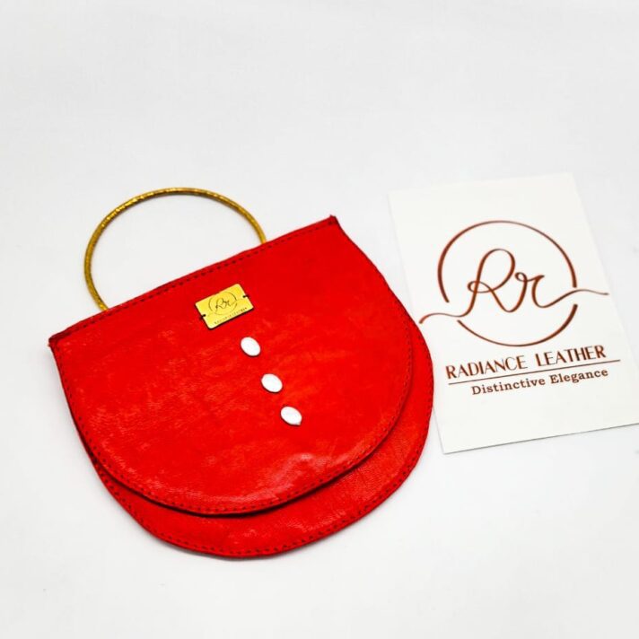 Radiance Leather Dw’e Half Moon Clutch Bag in 100% Cowhide with Seal print Red (flat view)