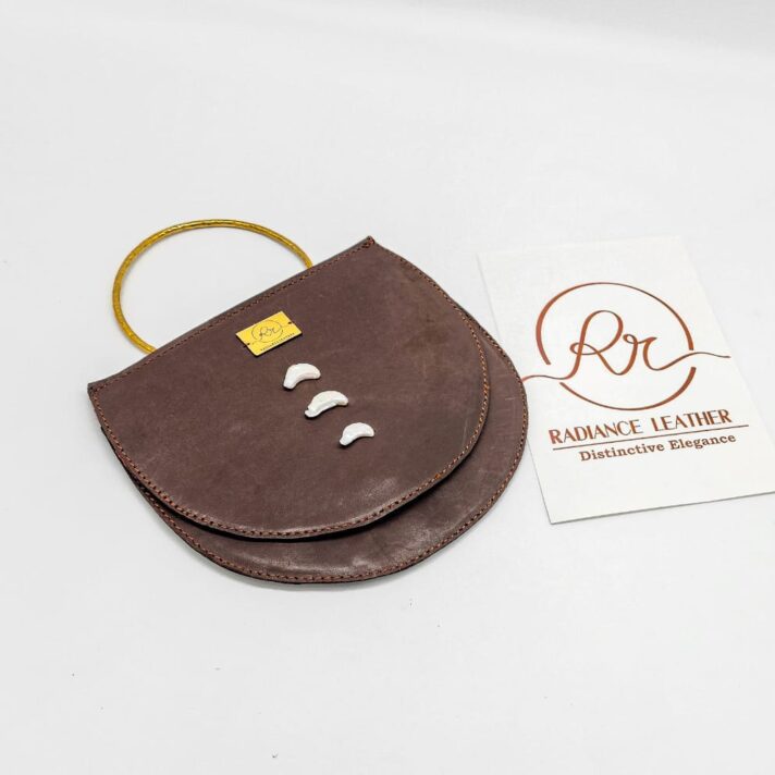 Radiance Leather Dw’e Half Moon Clutch Bag in 100% Cowhide with Seal print Mocca