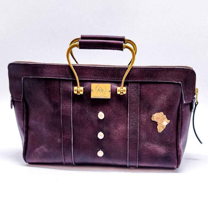 Radiance Leather Raza Clutch – A Stunning Beauty for Every Elegant Woman -100% Cowhide with Madonna print Vintage