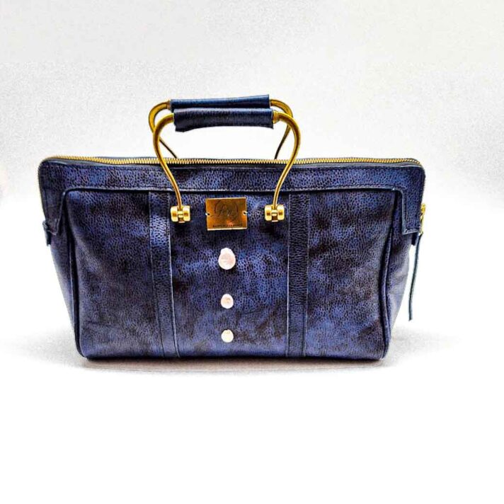 Radiance Leather Raza Clutch – A Stunning Beauty for Every Elegant Woman -100_ Cowhide with Wild Boar print