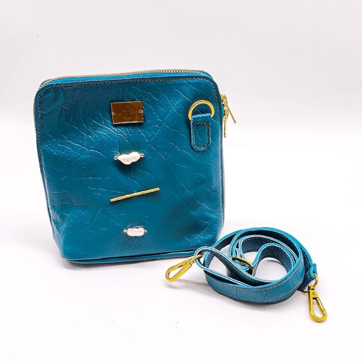 Radiance Leather Vikay Sling – Crocodile Print Turquoise Coloured Bag